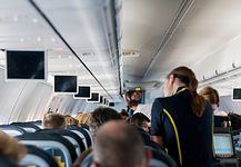 Inside a plane while service is offered.