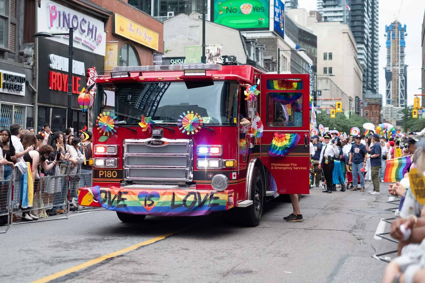 - The Complete Guide to Toronto's Nightlife for International Travelers Firefighter decorated at Toronto Pride, Canada. Pic by samantha-hare -unsplash.