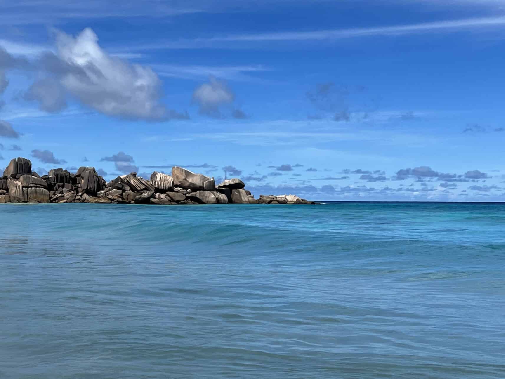 seychelles travel tips - Top Seychelles Travel Tips: Not to Miss Islands and Beaches Granite rocks in the sea at Grande Anse, Seychelles.