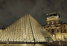 The pyramid at the Louvre museum in Paris at night.