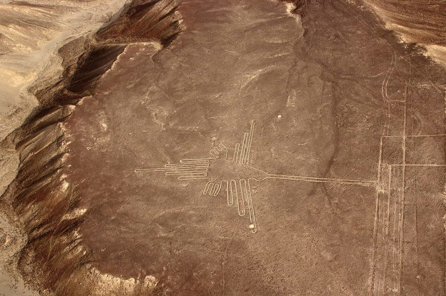 - Exploring Peru’s Travel Gems: A Journey Through Nine Must-Visit Destinations Mysterious lines and symbol at the Nazca plateau in Peru.