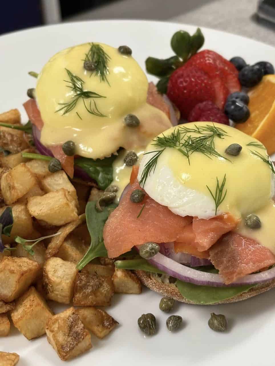 Where to Eat in Québec - What and Where to Eat in Québec Maritime Regions Poached egg with salmon at Le Délice Motel Restaurant in Mont-Saint-Pierre, Quebec, Canada.