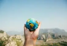 Travel the world - Globe in the hands. pexels-nurseryart-346885