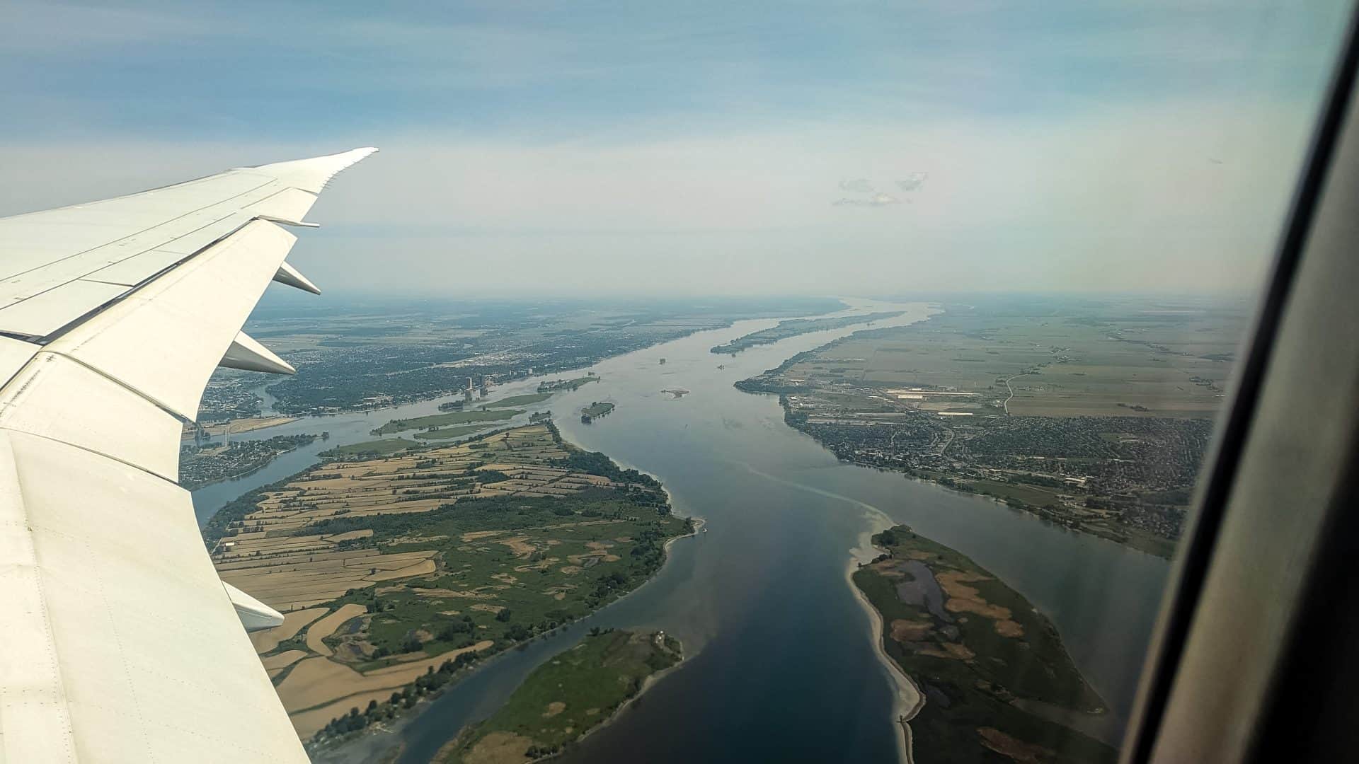 when to book flights - When to Book Flights, Hotels & More: Your Complete Travel Planning Guide Landing approach in Montreal, Canada.